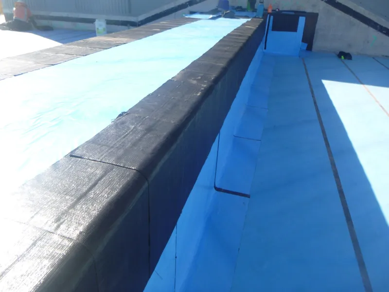 Parapet membrane capping deck run