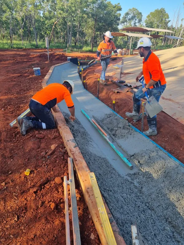Concrete crew kerb pour