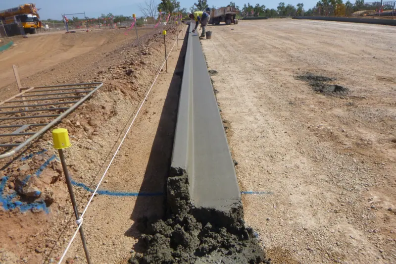 Freshly finished long concrete kerb