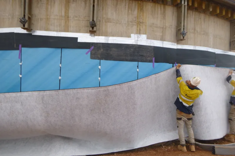 Crew hanging protection fabric tank wall