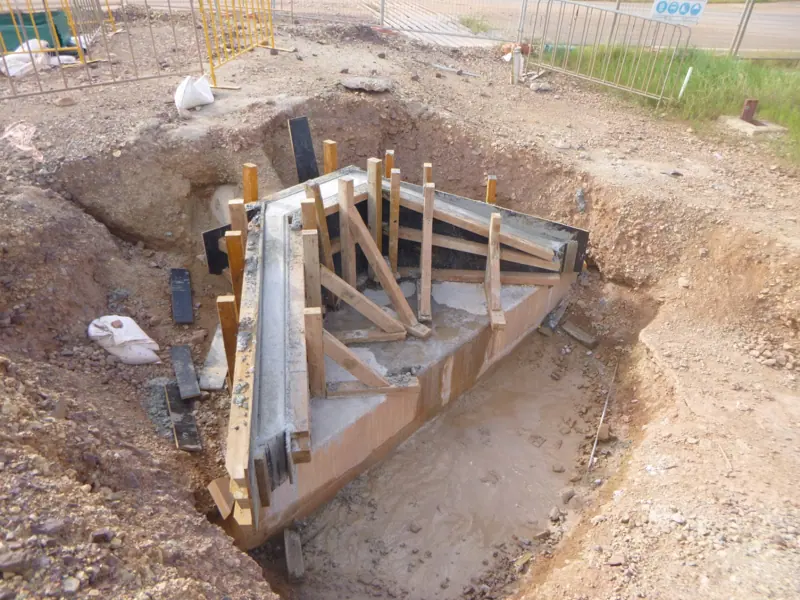 Timber formwork for an in-ground concrete pit