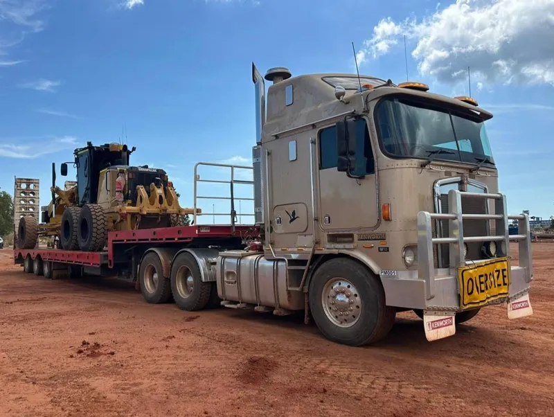 Kenworth float grader red dirt