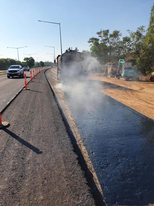 Seal sprayer truck shoulder run