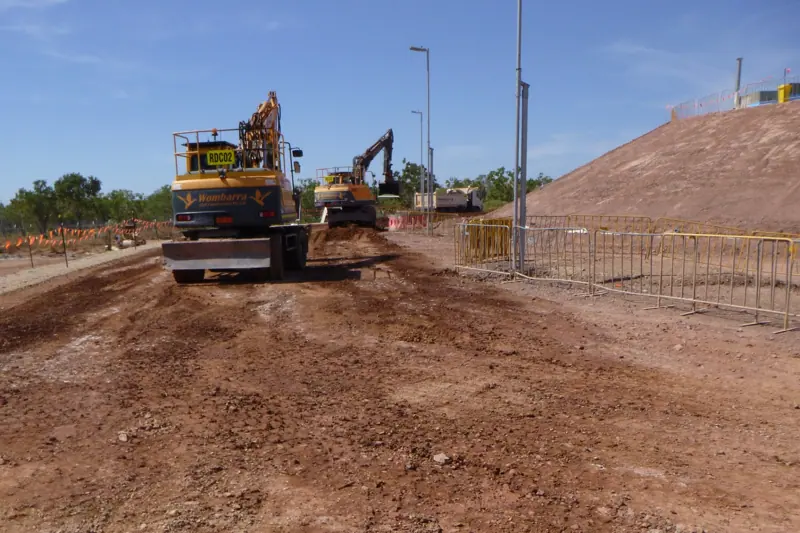 Two Wombarra wheeled excavators working a site haul road