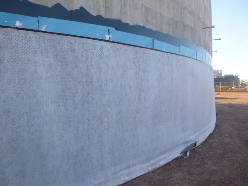 Completed tank wall protection fabric wrap